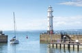 Sailing yacht leaving Newhaven harbour ,into the Firth of Forth,Edinburgh,Scotland,UK Royalty Free Stock Photo