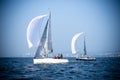 Sailing yacht race. Ship yachts with white sails in the open Sea. Luxury boats Royalty Free Stock Photo