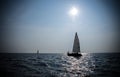 Sailing yacht race. Ship yachts with white sails in the open Sea. silhouettes of yachtsmen and boats Royalty Free Stock Photo