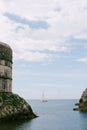 Sailing yacht at sea, sailing in the background Fort Bokar - on the walls of the old city of Dubrovnik, Croatia. Royalty Free Stock Photo