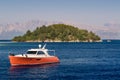 Sailing yacht at sea near small island