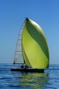 Sailing yacht with spinnaker in the wind