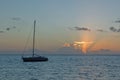 Sailing yacht and sunrise on the Pacific Ocean Royalty Free Stock Photo