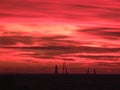 Sailing yachts against the backdrop of a colorful sunset over the Gulf of Finland. Kronstadt, Russia.
