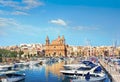 Sailing yachts at marina in front of Parish Church of St Joseph, Msida, Malta