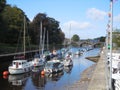 Sailing boats moored in river Royalty Free Stock Photo