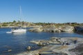 Sailingboat moored to cliff HuvudskÃÂ¤r Stockholm achipelago