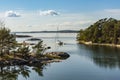 Sailingboat navigating through narrow passage Stockholm archipelago Royalty Free Stock Photo