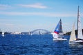 Sailings on the sea with Sydney Harbour Bridge and Opera House behind