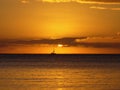 THE SAILNG BOAT IN HORIZON WITH BEAUTIFUL SUNSET COLORS