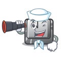 Sailor with binocular N button attached to mascot keyboard Royalty Free Stock Photo