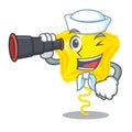 Sailor with binocular star balloon in the cartoon shape
