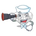 Sailor with binocular white diamond isolated in the cartoon