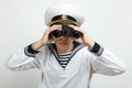 Sailor looking through binoculars Royalty Free Stock Photo