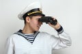 Sailor looking through binoculars Royalty Free Stock Photo