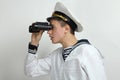 Sailor looking through binoculars Royalty Free Stock Photo