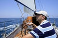 Sailor sailing in the sea. Sailboat over blue