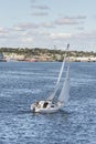 Sailor sailing the Sweet Silence up Acushnet River Royalty Free Stock Photo