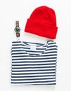 Sailor striped shirt and red wool cap with diving watch