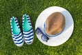 Sailor style summer accessories on green grass
