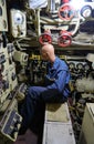 Sailor in the technical room in the submarine