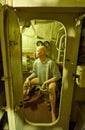 Sailor on the toilet in the submarine