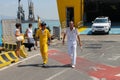 Sailors of ferry boat Corsica Express at berth in Piombino seaport, Italy