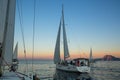 Sailors participate in sailing regatta 12th Ellada Autumn 2014 among Greek island group in the Aegean Sea. Royalty Free Stock Photo