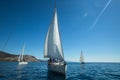 Sailors participate in sailing regatta 12th Ellada Autumn 2014 among Greek island group in the Aegean Sea