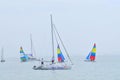 Sailors are preparing sailing boats ready for a race in the Nha Trang bay Royalty Free Stock Photo