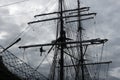 Sailors working aloft in the rigging, traditional tallship