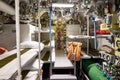 sailors' beds and other equipment in the compartment of an old diesel submarine