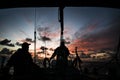 Sailors on a yacht during sunset over the North Sea Royalty Free Stock Photo