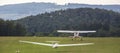 Sailplane and a towing aircraft starting on an airfield Royalty Free Stock Photo