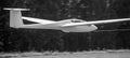 sailplane with towing rope starting on an airfield black and white Royalty Free Stock Photo