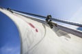 Sails on a sailboat at sea in the north of summer. Royalty Free Stock Photo