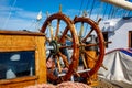 Sailship deck with helm, rigging and cables. Royalty Free Stock Photo