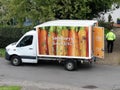 Sainsbury`s home delivery van supplying groceries to elderly women during the Coronavirus COVID-19 pandemic