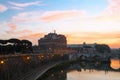 The Saint Angel Castle and bridge Sant Angel at sunset , Rome, Italy
