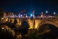 Saint Angelo Bridge over Tiber River in Rome at night, Italy Royalty Free Stock Photo