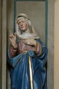 Saint Anne, statue on the altar of St. Valentine in the Church of the Holy Name of Mary in Kamanje, Croatia Royalty Free Stock Photo