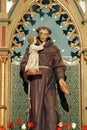 St Anthony holding a child Jesus, a statue on the altar of St Anthony of Padua in the church of St George in Desinic, Croatia Royalty Free Stock Photo