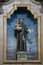 Saint Anthony holds the child Jesus, Altar of Saint Anthony of Padua in the Franciscan Church of Saint Peter in Cernik, Croatia