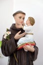 Saint Anthony of Padua holding baby Jesus Royalty Free Stock Photo