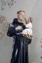 Saint Anthony of Padua holding the baby Jesus, statue in the church of Saint John the Baptist in Gornji Desinec, Croatia Royalty Free Stock Photo