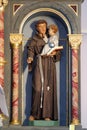 Saint Anthony of Padua holds baby Jesus Royalty Free Stock Photo