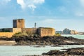 Saint Aubin Fort in a low tide with Elizabeth castle in the background, La Manche channel, bailiwick of Jersey, Channel Islands Royalty Free Stock Photo