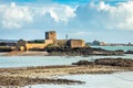 Saint Aubin Fort in a low tide with Elizabeth castle in the background, La Manche channel, bailiwick of Jersey, Channel Islands Royalty Free Stock Photo