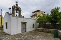 The Saint Catherine Agia Ekaterini greek - orthodox old chapel with it`s paved backyard in Archanes town, Heraklion prefecture,