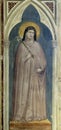 Saint Clare of Assisi holding a lily, fresco by Giotto di Bondone, Basilica di Santa Croce in Florence Royalty Free Stock Photo